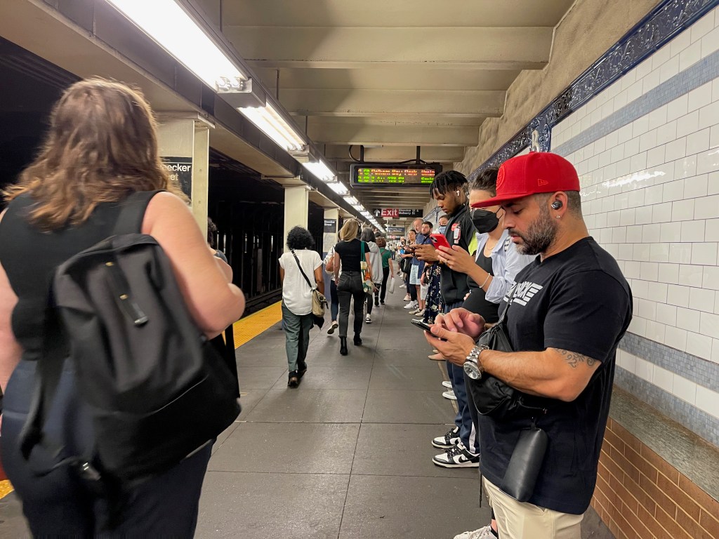 Waiting for the subway at Bleecker Street